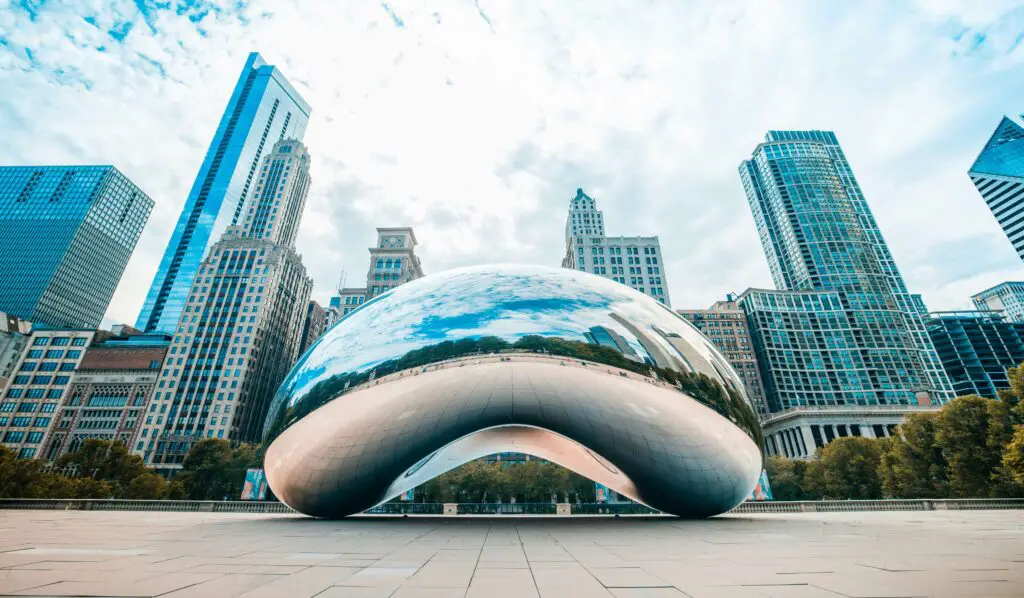 Downtown Chicago skyline with adults enjoying group activities like architecture tours and rooftop gatherings.