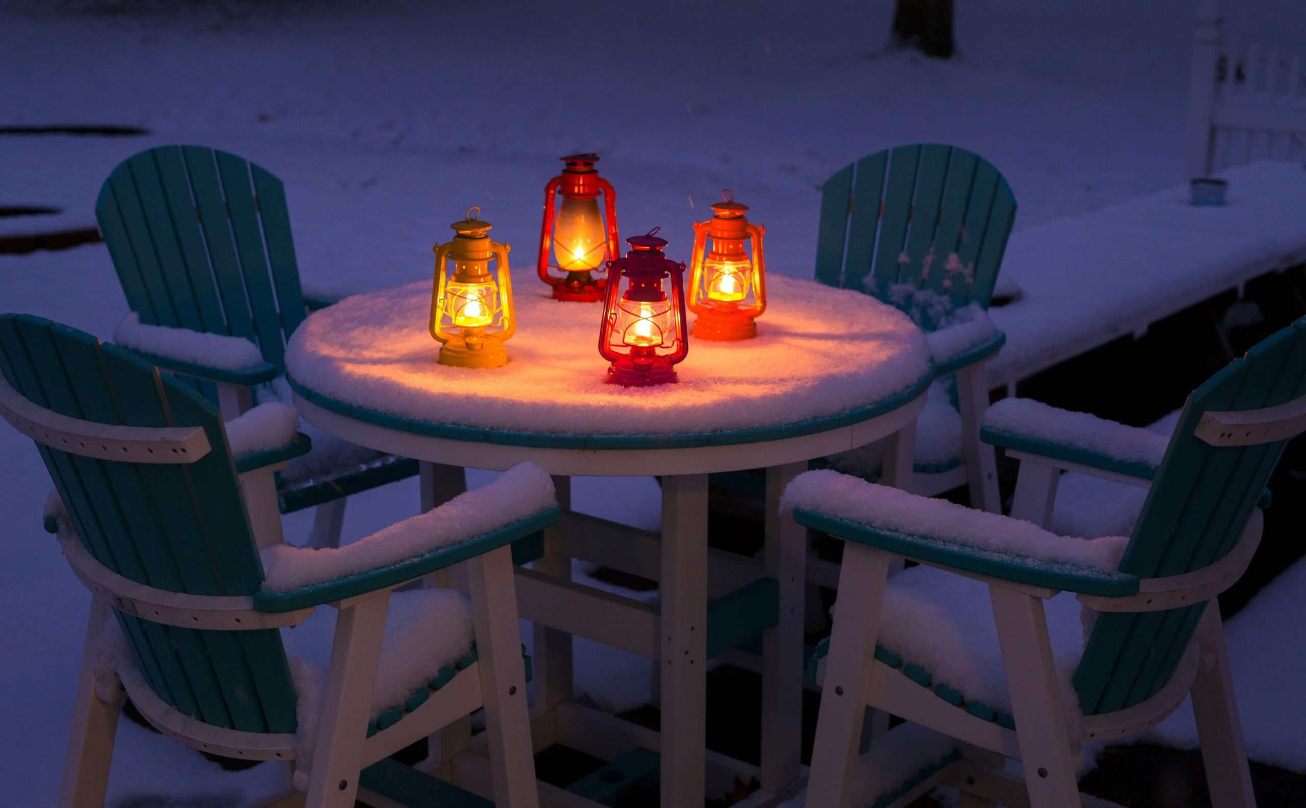 Outdoor table with chairs and string lights creating a romantic atmosphere, perfect for a date night in Naperville.
