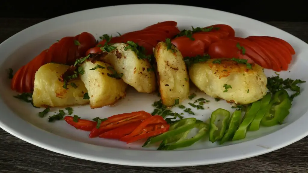 Culinary Journeys in the Lower East Side: Flavorful Activities You Can’t Miss Close-up of a flavorful dish served at a trendy restaurant in the Lower East Side, showcasing the area's diverse culinary scene.
