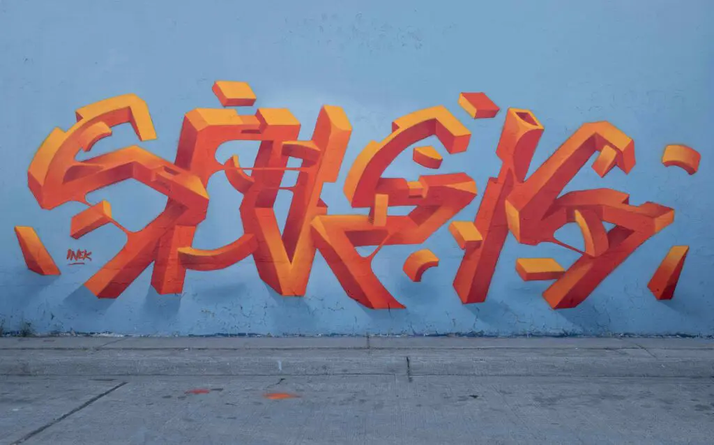 The Bushwick Art Scene: Things to Do in Bushwick NYC Colorful mural with bold letters and creative drawings on a wall in Bushwick, NYC, showcasing the neighborhood’s vibrant street art.