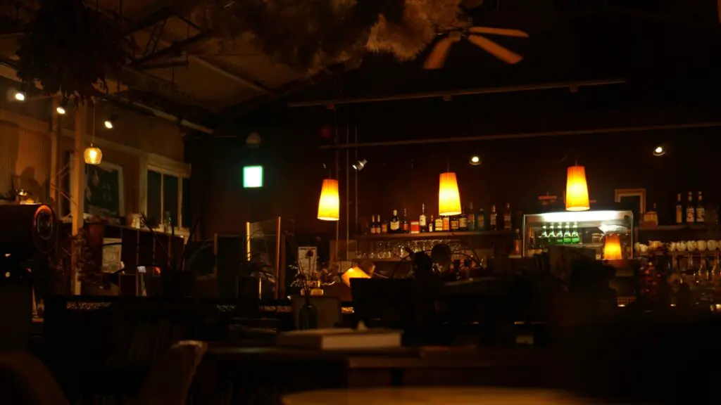 After Dark: Bushwick Nightlife Without the Noise Cozy and quiet bar-style setting in Bushwick at night, with warm lights and a calm atmosphere.